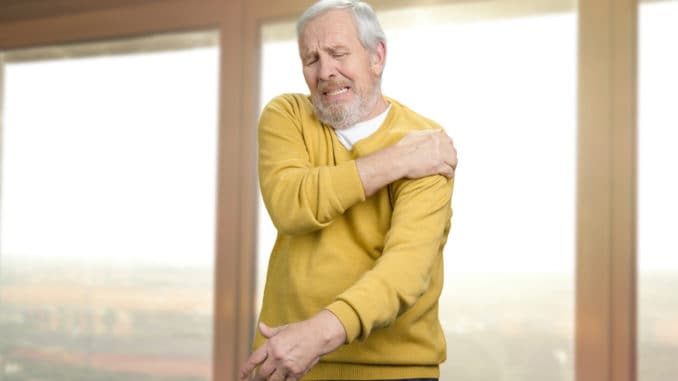 dreamstime_m_113566563 Old senior man with shoulder pain.
