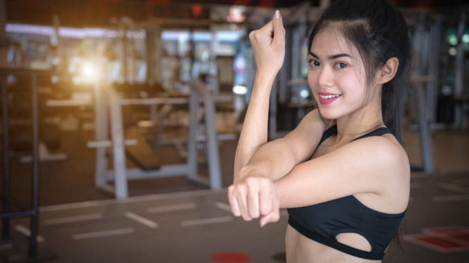 Sport woman exercising in gym