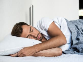 Attractive young man sleeping