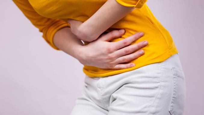 Woman suffer from belly pain. Peptic Ulcer