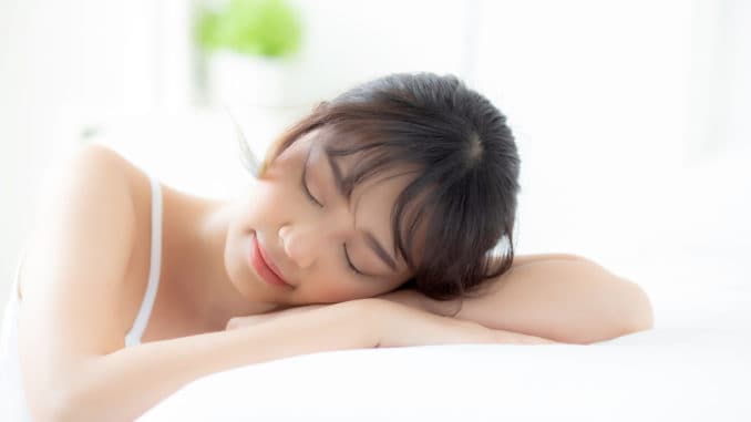 Lifestyle beautiful portrait young asian woman relax lying sleep Bright Light Therapy