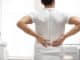 Man suffering from back pain in orthopedist s office