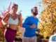 Young happy men and women jogging at the park. healthy lifestyle