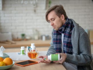 Man taking medication