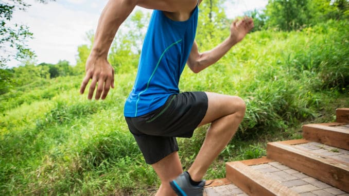 Close-up Of Man Jogging On The Staircase