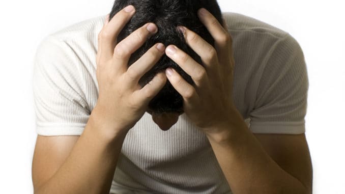 dreamstime_m_35154351 A young man alone and worried