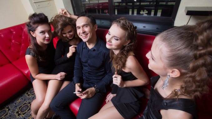 sexy lovelace man surrounded by hot women wanting of proposal from him Portrait of lovelace men surrounded by hot women wanting of proposal from him