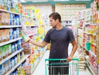 Young man in the supermarket