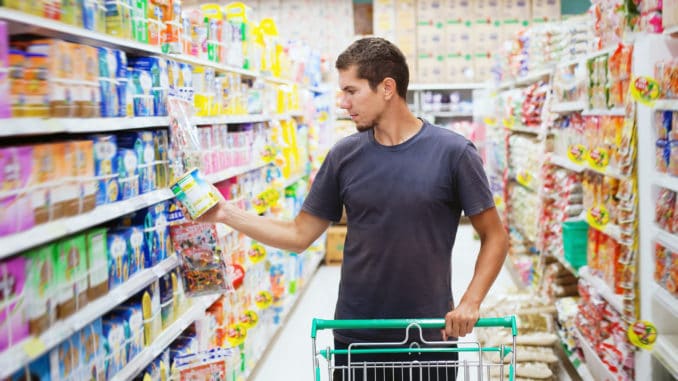 Young man in the supermarket