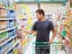 Young man in the supermarket