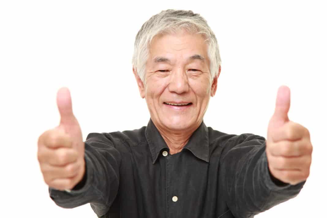 Chinese man with thumbs up