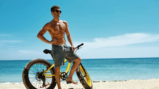 Fitness Male Model With Bike Sunbathing On Sun