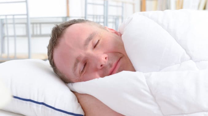 dreamstime_m_74299958 Man peacefully sleeping at home