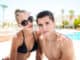 Summer vacation couple on sunny day in tropical resort