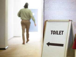 Man going to public toilet