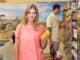 Portrait of a pretty smiling blonde women buying products at supermarket