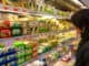 Young brunette woman shopping in supermarket